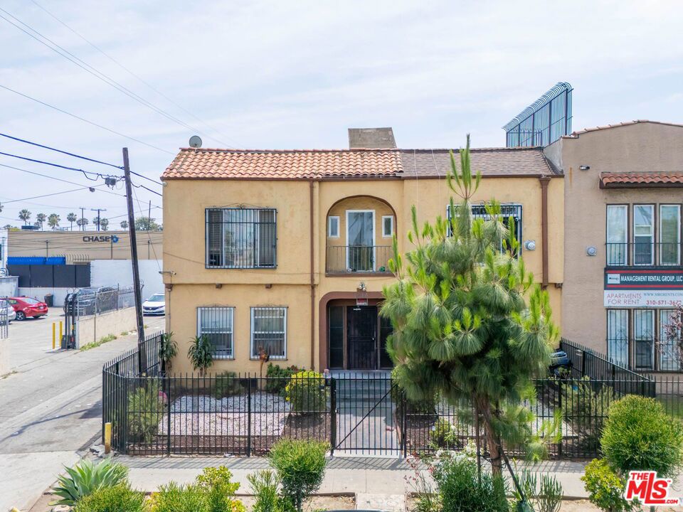 1014 W 57th Street, Los Angeles, CA 90037 — MLS #26835457 — Main listing photo